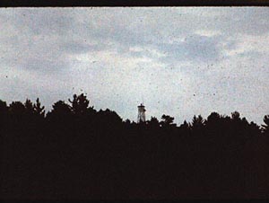 Kahshahpiwi fire tower from a 
               distance, 1979